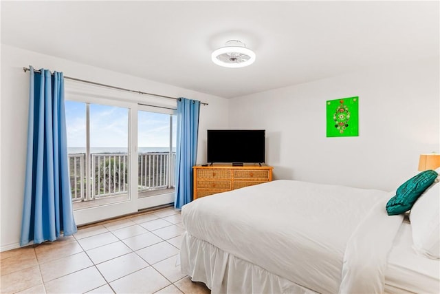 700 Island Retreat Rd Unit 138, Port Aransas, TX 78373 - tiled bedroom with access to exterior