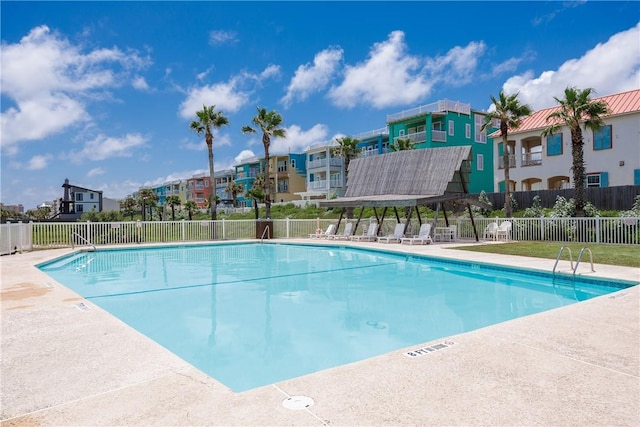 700 Island Retreat Rd Unit 138, Port Aransas, TX 78373 - community pool featuring a residential view