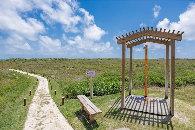 700 Island Retreat Rd Unit 138, Port Aransas, TX 78373 - view of yard featuring a pergola