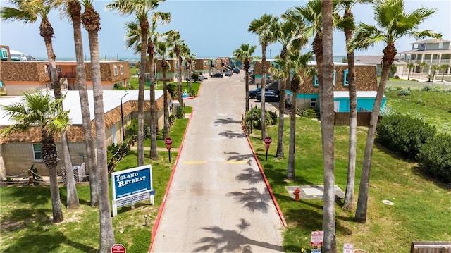 700 Island Retreat Rd Unit 138, Port Aransas, TX 78373 - view of asphalt street with traffic signs and a residential view