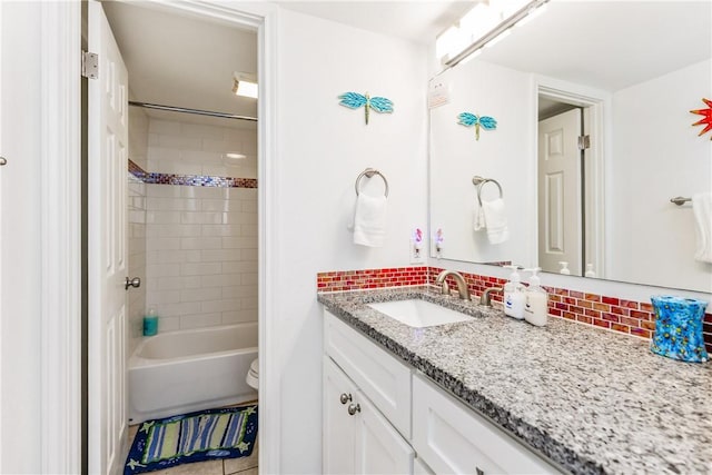 700 Island Retreat Rd Unit 138, Port Aransas, TX 78373 - bathroom featuring vanity, tasteful backsplash, shower / bath combination, and tile patterned flooring