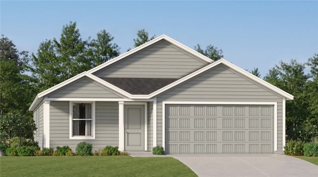 view of front of home with a front yard and a garage