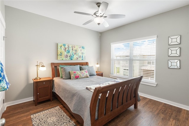 bedroom featuring dark wood-type flooring and ceiling fan