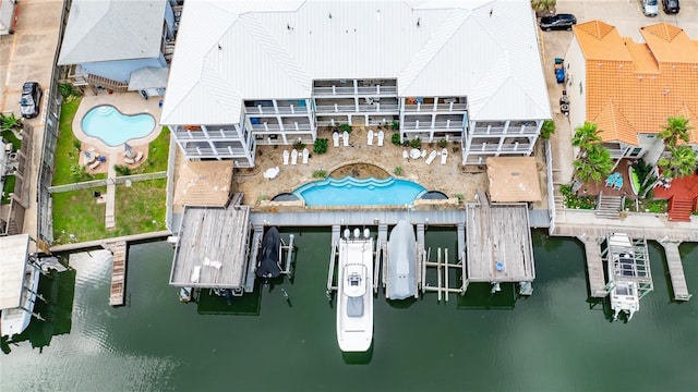 drone / aerial view with a water view