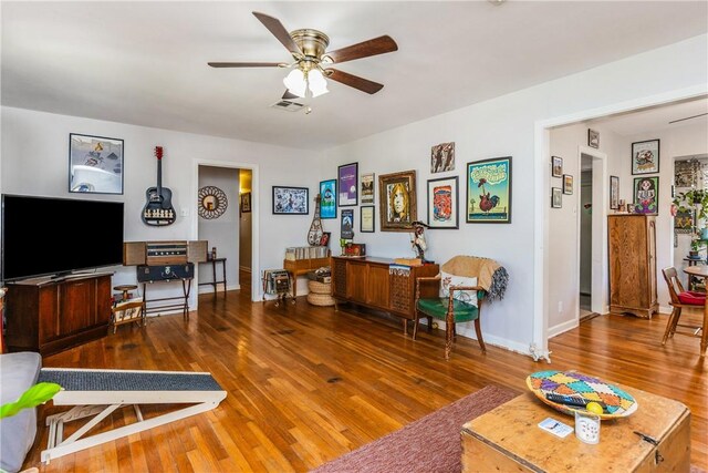 4009 Pope Dr, Corpus Christi, TX 78411 - living room with a ceiling fan and wood finished floors