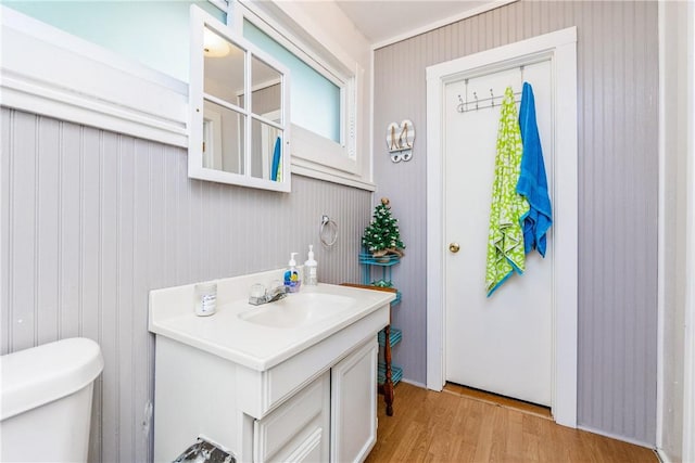 4009 Pope Dr, Corpus Christi, TX 78411 - bathroom featuring wood finished floors and vanity