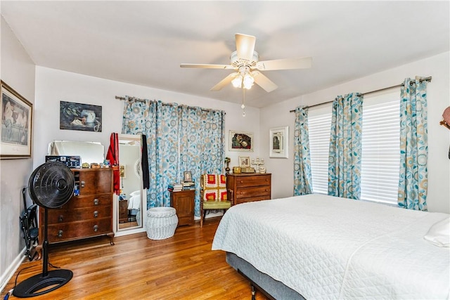 4009 Pope Dr, Corpus Christi, TX 78411 - bedroom with wood finished floors and a ceiling fan