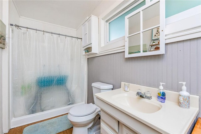 4009 Pope Dr, Corpus Christi, TX 78411 - full bathroom featuring vanity, a shower with curtain, and wood finished floors