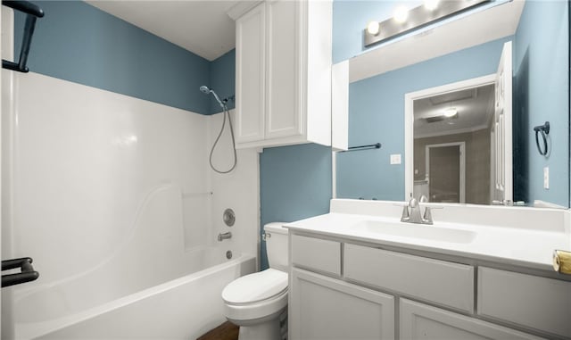 full bathroom with vanity,  shower combination, and toilet