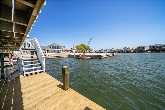dock area featuring a water view