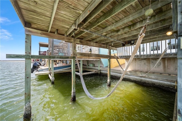 dock area featuring a water view