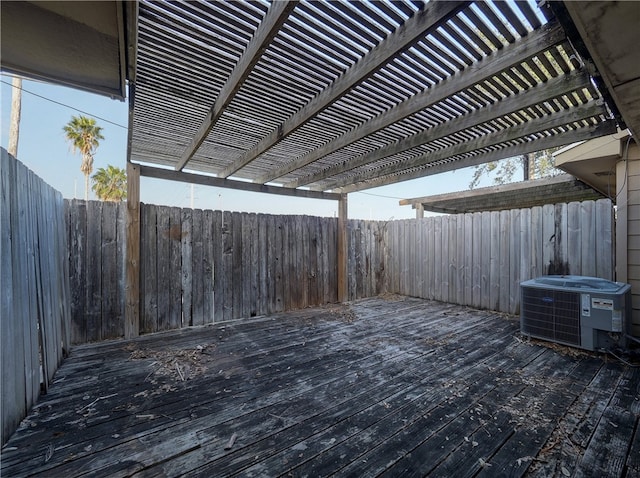 wooden terrace with a pergola and central AC unit