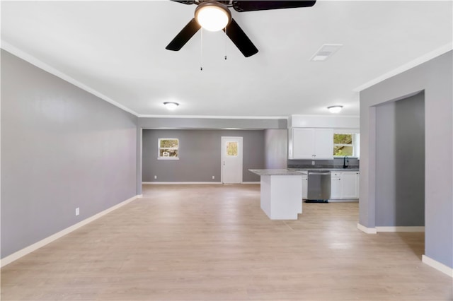 2121 Cedar St, Paris, TX 75460 - kitchen featuring dishwasher, ornamental molding, white cabinetry, ceiling fan, and open floor plan