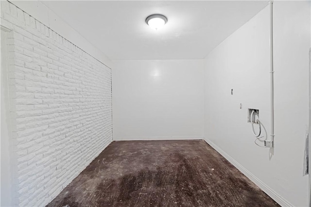 2121 Cedar St, Paris, TX 75460 - bonus room with concrete flooring and brick wall