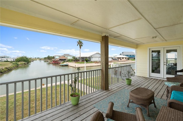 219 Pintail Ln, Rockport, TX 78382 - balcony featuring a water view, french doors, and a residential view