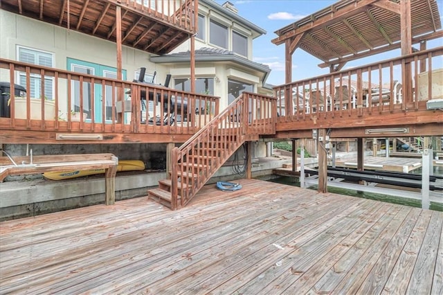 dock area featuring a deck and stairway