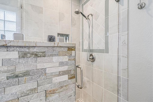 full bathroom with a shower stall