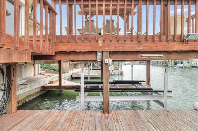 dock area featuring a water view and boat lift