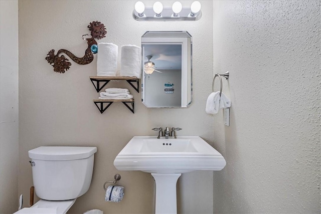 bathroom featuring toilet