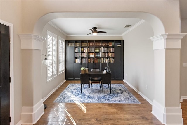 6105 Greenough Ct, Corpus Christi, TX 78414 - office space with arched walkways, a ceiling fan, wood finished floors, and crown molding