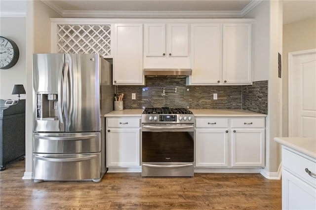 6105 Greenough Ct, Corpus Christi, TX 78414 - kitchen with stainless steel appliances, white cabinetry, ornamental molding, light countertops, and tasteful backsplash