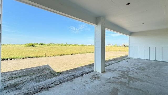 view of patio / terrace featuring a rural view