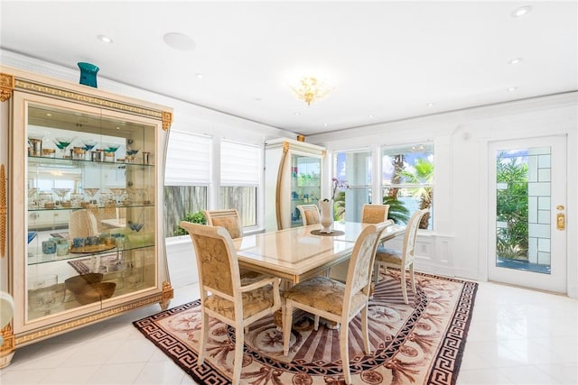 dining space featuring recessed lighting