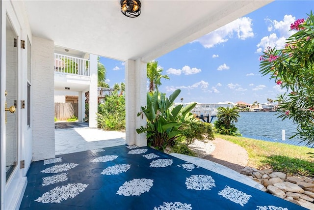 view of patio featuring a water view