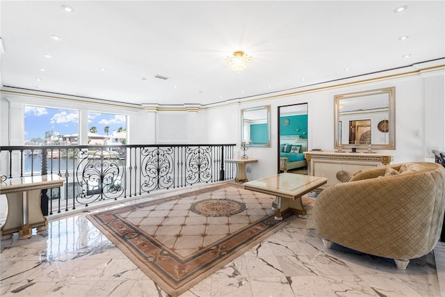 sitting room featuring recessed lighting, visible vents, marble finish floor, and ornamental molding