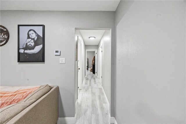 3614 Capri Dr, Corpus Christi, TX 78415 - hall with light wood-style floors and baseboards