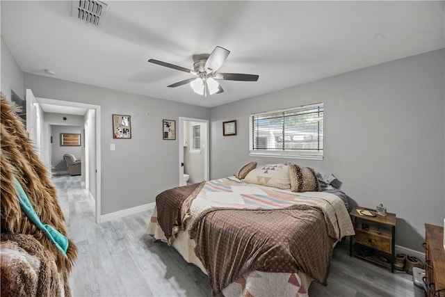 3614 Capri Dr, Corpus Christi, TX 78415 - bedroom with light wood finished floors and a ceiling fan
