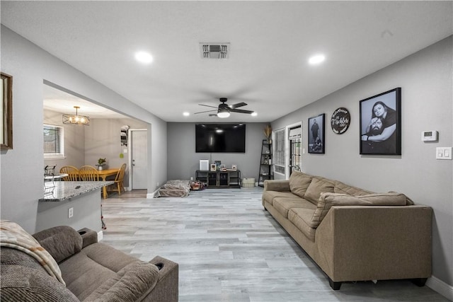 3614 Capri Dr, Corpus Christi, TX 78415 - living area with recessed lighting, light wood-type flooring, a ceiling fan, and a chandelier