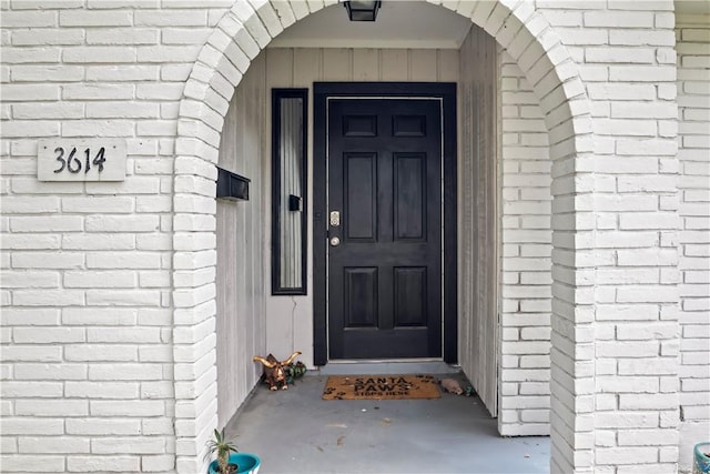 3614 Capri Dr, Corpus Christi, TX 78415 - view of exterior entry featuring brick siding