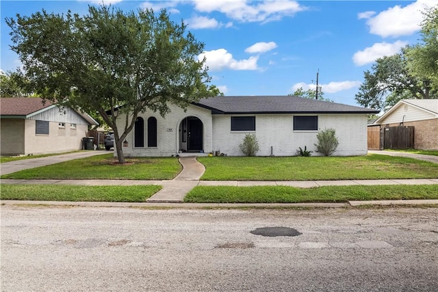 3614 Capri Dr, Corpus Christi, TX 78415 - view of front of property featuring brick siding and driveway