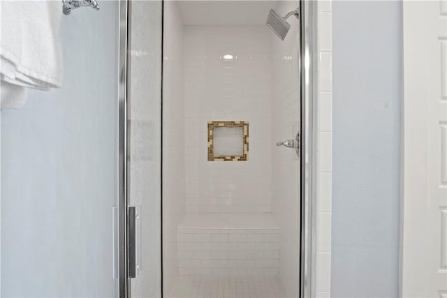 bathroom with a stall shower