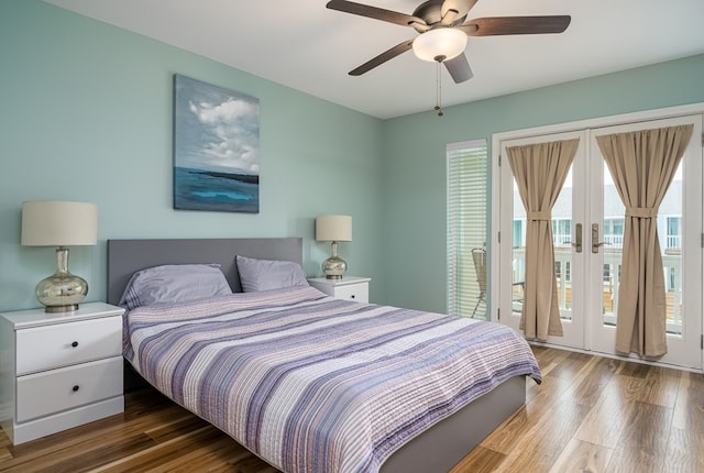 bedroom featuring hardwood / wood-style floors, access to exterior, and ceiling fan