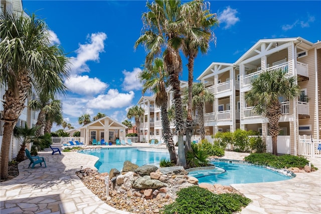 view of pool featuring a patio area