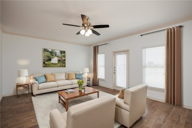 living room featuring hardwood / wood-style flooring, crown molding, and ceiling fan