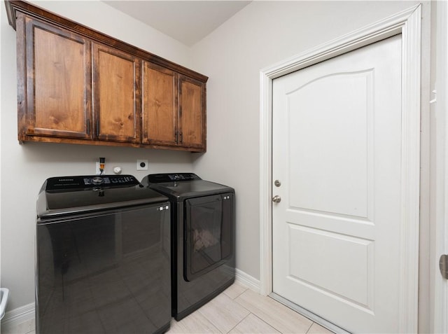 3141 Piranha Dr, Corpus Christi, TX 78414 - washroom featuring cabinet space, washing machine and clothes dryer, and baseboards
