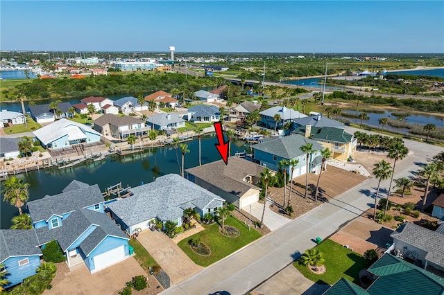 bird's eye view with a water view