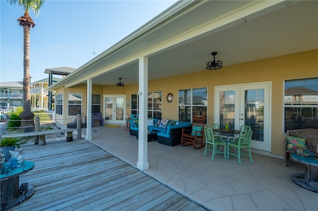 wooden terrace featuring french doors