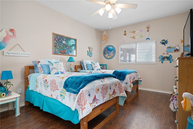 bedroom with dark hardwood / wood-style floors and ceiling fan