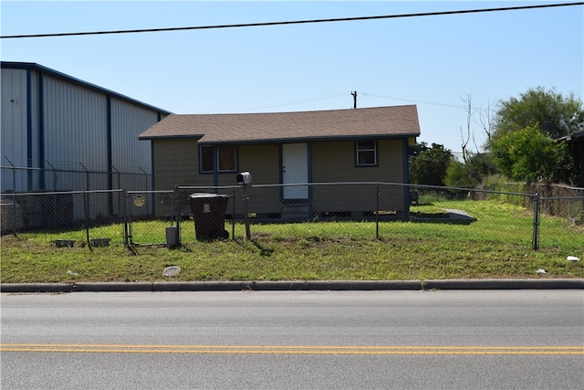 view of front of home with a front yard