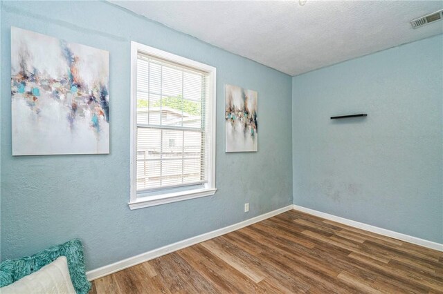 10634 Veda Dr, Corpus Christi, TX 78410 - unfurnished room with wood finished floors and baseboards