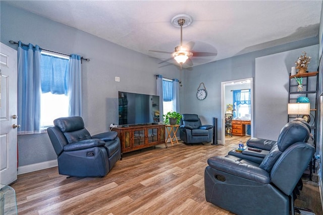10634 Veda Dr, Corpus Christi, TX 78410 - living area featuring light wood-style floors, ceiling fan, and baseboards