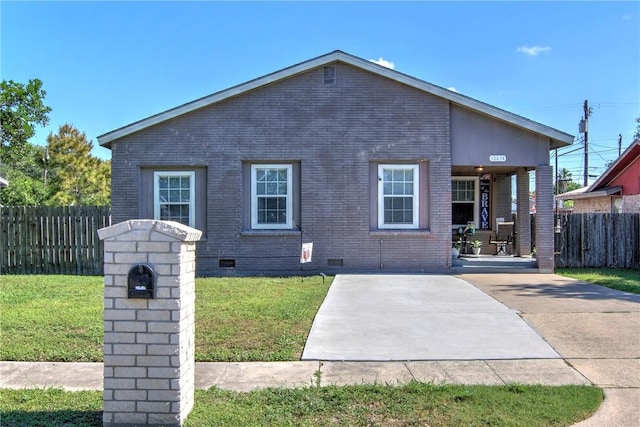 10634 Veda Dr, Corpus Christi, TX 78410 - back of house featuring crawl space, brick siding, a patio area, and a porch