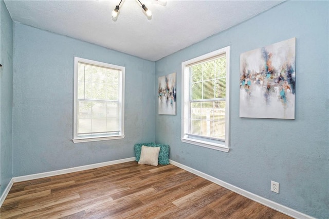 10634 Veda Dr, Corpus Christi, TX 78410 - empty room with wood finished floors and baseboards