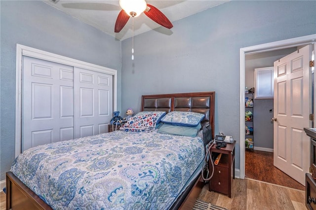 10634 Veda Dr, Corpus Christi, TX 78410 - bedroom with wood finished floors, a closet, baseboards, and a ceiling fan