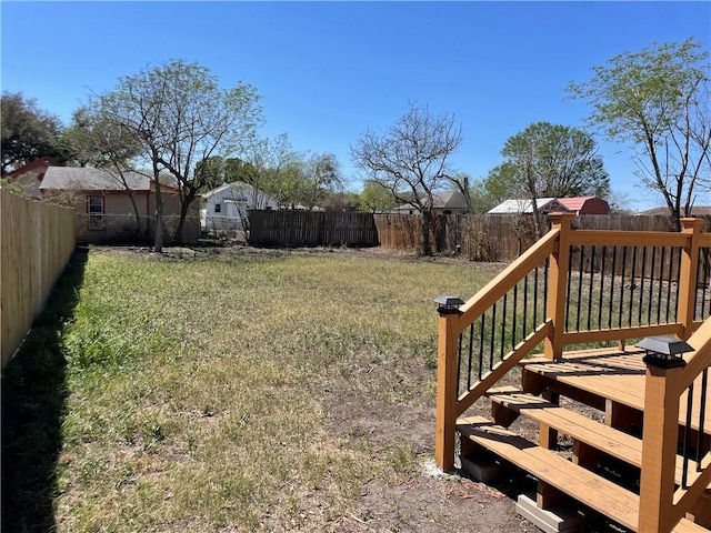 view of yard featuring a fenced backyard