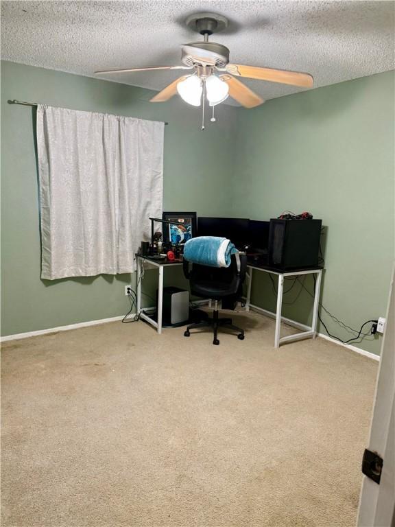 11614 Coleta Creek Dr, Corpus Christi, TX 78410 - office featuring a textured ceiling, carpet, and a ceiling fan